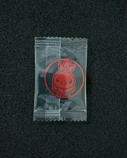 2025 Pokemon TCG S.Chinese Glow In The Dark Coin Red Torchic Sealed LU57 - Image 1