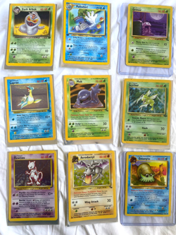 Lot of vintage Holo and non-Holo Pokemon cards - Image 1
