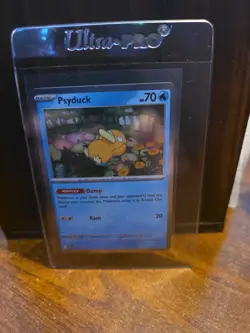 2025 Pokemon Mega Evolution Blister Pack Black Star Promo Cosmos Holo Psyduck #7 - Image 1