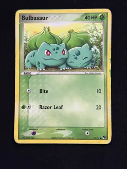 Bulbasaur #12/17 - Pokemon TCG - Pop Series 2 - DMG - Image 1