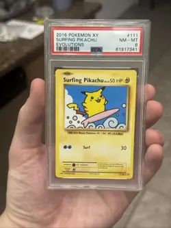 PSA 8 - 2016 POKEMON XY EVOLUTIONS #111 SURFING PIKACHU 111/108 - Image 1