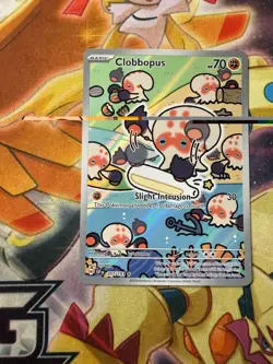 Clobbopus 207/191 Illustration Rare Pokemon SV Surging Sparks Near Mint - Image 1