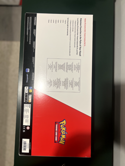Pokemon TCG Scarlet & Violet Prismatic Evolutions - Costco Exclusive 8 Pack Tin - Image 2