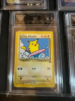 Pokemon Surfing Pikachu 28 Black Star Promo GetGraded 8.5 - Grade - Image 1