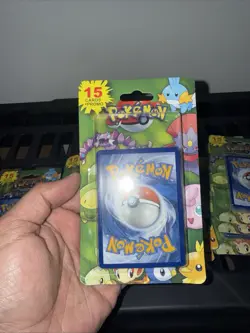 2012 Pokemon Card MJ Holding Blister Pack, "15 Cards + 1 Promo" Sealed - Image 1