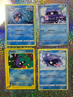 Pokemon Regular Shellder: Expedition Base Set 129/165; Sword & Shield 040/202 - Image 1