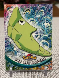 1999 Topps Pokemon #11 Metapod (TV Animation Series 1) 3rd Print Green Logo NM - Image 1
