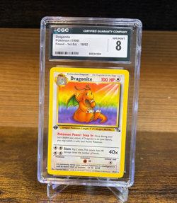 DRAGONITE POKEMON 1999 FOSSIL 1ST EDITION 19/62 CGC 8 NR/MINT - Image 1