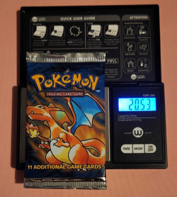 Wizards of the Coast Pokemon Base Set Booster Pack Charizard Pack Art - Image 1