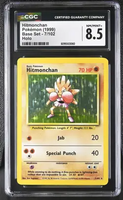 CGC 8.5 Hitmonchan 7/102 Holo Base Set Pokemon Card - Image 1
