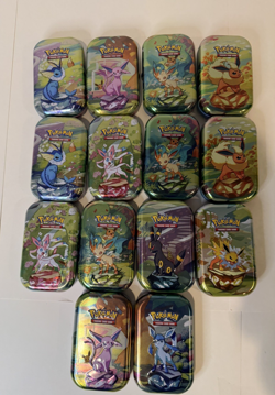 Pokemon TCG - Empty Tin Lot - 14 EMPTY Tins from the Prismatic Evolutions Set - Image 1