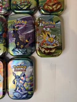 Pokemon TCG - Empty Tin Lot - 14 EMPTY Tins from the Prismatic Evolutions Set - Image 5