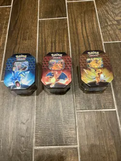 Pokemon Hidden Fates Tins Charizard Gyarados Raichu GX Boxes - Set of 3 - Image 1