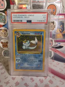 Pokemon Vaporeon Holo Rare TCG Card 12/64 Jungle Unlimited, PSA 5 - Image 1