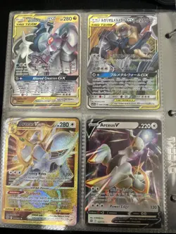 Pokemon Cards With Red And White Binder (130 Pokemon Cards) - Image 1