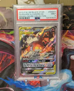 Pokemon PSA 9 Reshiram & Charizard GX #SM201 Sun & Moon Black Star Promo - Image 1