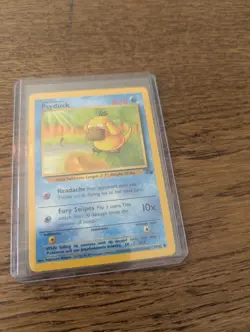 Pokemon Psyduck NM 1st Edition Normal Fossil - Image 1