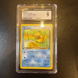 CGC MINT 9 Pokemon Psyduck 53/62 1999 Fossil 1st Edition - Image 1