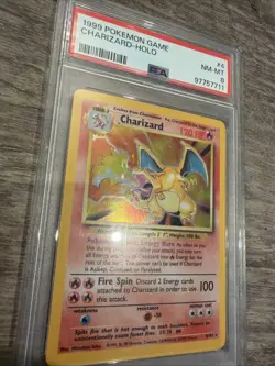1999 POKEMON BASE SET UNLIMITED #4 CHARIZARD-HOLO PSA 8 - Image 1