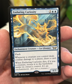 MTG Enduring Curiosity Normal NM Duskmourn: House of Horror Magic 51 - Image 1