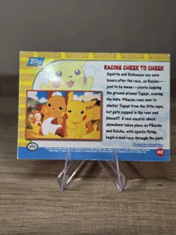 Racing Cheek to Cheek #48 - Pikachu's Vacation Movie Edition- Topps Pokemon Card - Image 2