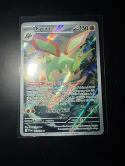 Flygon 101/094 Me02: Phantasmal Flames Holo Pokemon Card Full Art - Image 1