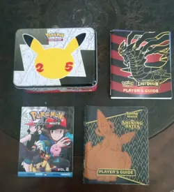 Huge Lot Of Pokemon Cards, Player Guides, Sealed Packs, Manga And Lunch Box Tin - Image 1
