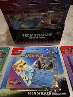 Pokemon Prismatic Evolutions Tech Sticker Collection Case (Lot of 12) Sealed - Image 2