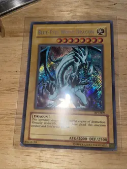 Blue Eyes White Dragon BPT-009 Secret Rare PLAYED, See Pics - Image 1