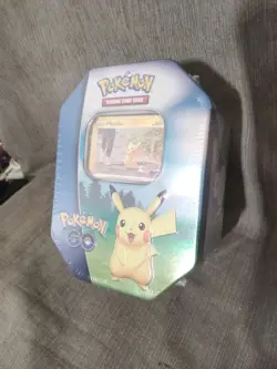 Pokemon GO Tin - Pikachu Promo - 4 Pokemon Card Booster Packs - Sticker Sheet - Image 1