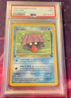 1999 Pokemon fossil #54 Shellder 1st Edition PSA 9 Mint - Image 1