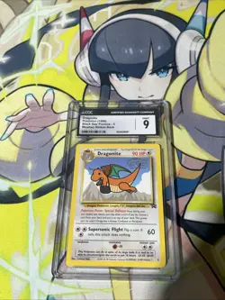CGC 9 MINT Dragonite 1999 Black Star Promo 5 WB Movie Promo Pokemon Card - Image 1