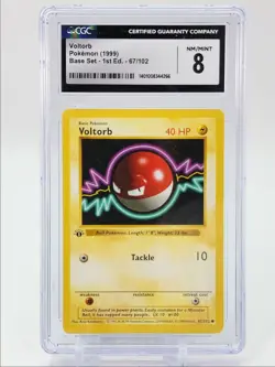 VOLTORB 1999 POKEMON BASE SET 1ST EDITION SHADOWLESS C 67/102 CGC 8 - Image 1