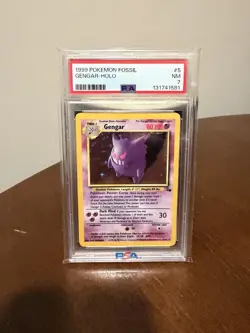 1999 POKEMON FOSSIL #5 GENGAR-HOLO PSA 7 - Image 1