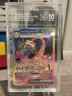 Pokemon Alolan Exeggutor ex Surging Sparks 242/191 SIR TAG Gem Mint 10 984/1000 - Image 1