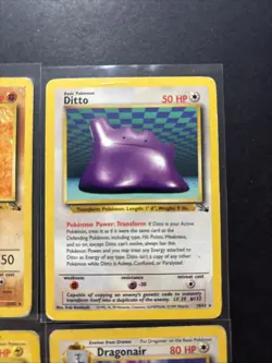 Lot of (4) HP/DMG Pokemon WOTC RARE Hitmonlee Ditto Raichu Dragonair Fossil Base - Image 3