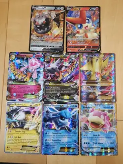 Lot Of 8 RARE Holo Pokemon Cards EX And V - Image 1