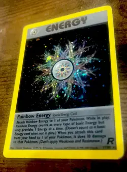 Pokemon Cards: Team Rocket 1st Edition Rare Holo: Rainbow Energy RARE # 17/82 - Image 1
