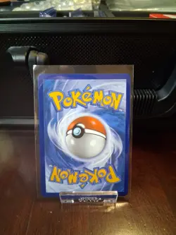 Team Rocket's Meowth (Cosmos Holo) Common 149/182 NM - Image 2