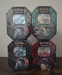 Pokemon TCG Paldean Fates Tin Set of 4 - Charizard ex, Great Tusk, Iron Treads - Image 1