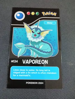 2024 POKEMON POKEDEX BLACK Edition Card #134 Vaporeon Peru US Seller - Image 1