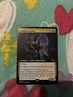 Likeness Looter (Extended Art) Wilds of Eldraine Regular - Image 1