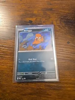 Pokemon TCG Scraggy Black Star Promo SVP186 Cosmos Holo Card - Image 1