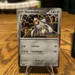 Pokemon Duraludon (Surging Sparks Stamped) 129/191 Promo Cosmos Holo - Image 1