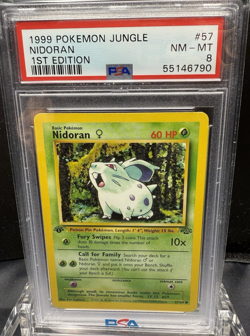 1999 POKEMON JUNGLE NIDORAN 1ST EDITION #57 PSA 8 - Image 1