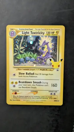 a SWIRL Light Toxtricity SWSH137 SWSH: Sword & Shield Promo Cards Holo - Image 2