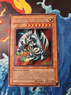 Yu-Gi-Oh TCG Blue-Eyes Toon Dragon MRL-000 Unlimited Secret Rare Card (LP - MP) - Image 1