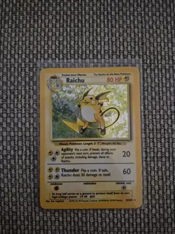 Pokemon TCG Raichu Card 14/102 Base Set Unlimited Holo Rare - Image 1