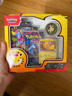New Pokemon Day 2026 Collection, 3 Packs & Pikachu IN HAND- DAMAGED BY SHIPPING - Image 1