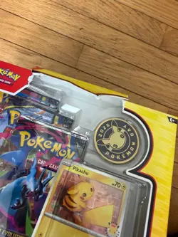 New Pokemon Day 2026 Collection, 3 Packs & Pikachu IN HAND- DAMAGED BY SHIPPING - Image 3